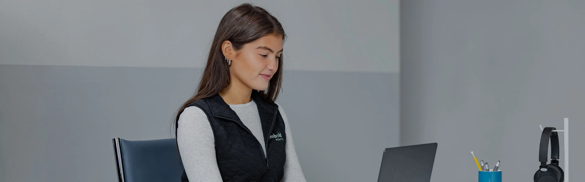 Shop custom vests for the office and the greens.